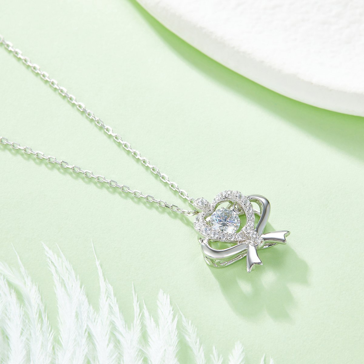 Dancing Moissanite Heart & Bow Necklace - Image 4