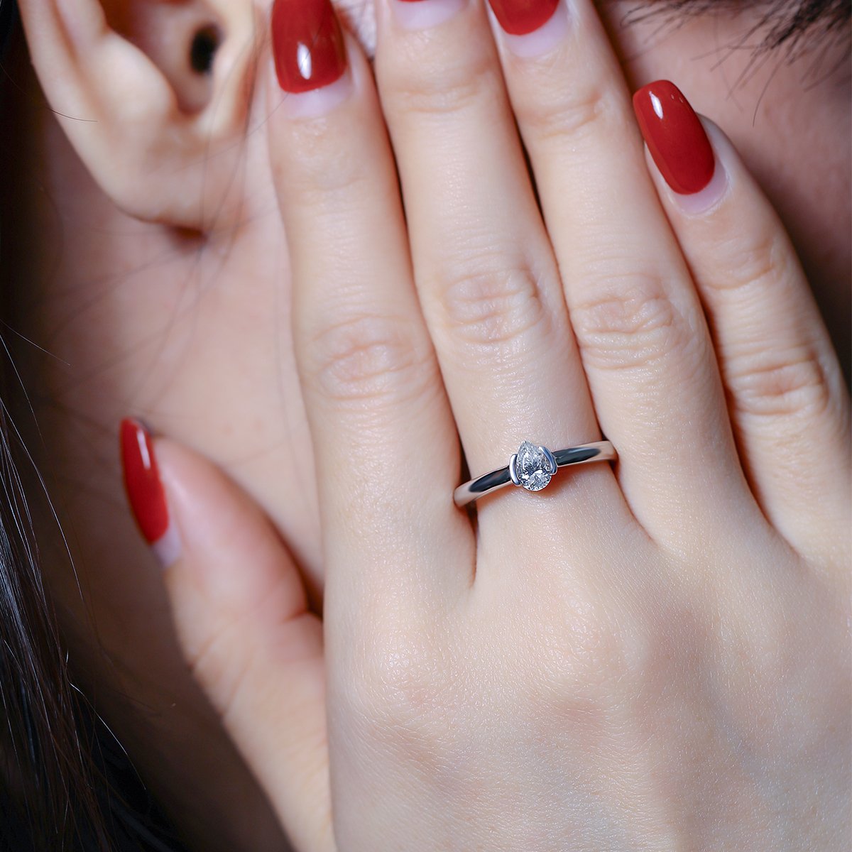 Pear-Cut Moissanite East-West Solitaire Ring - Image 8