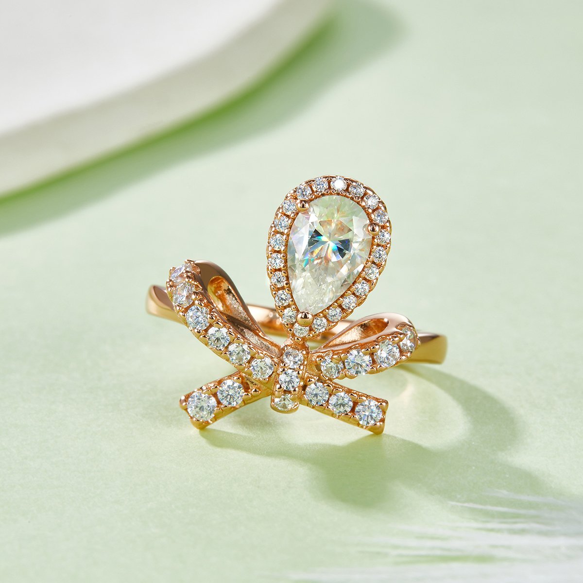 Pear Moissanite Ring - 1ct DEW Pave Bow in White Gold - Image 4