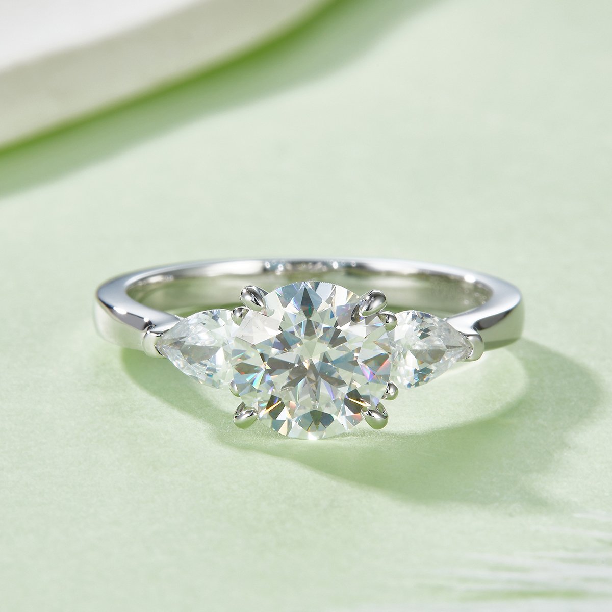 Round Moissanite Three-Stone Ring | 2ct DEW (8mm) Center | Pear Side Stones - Image 2