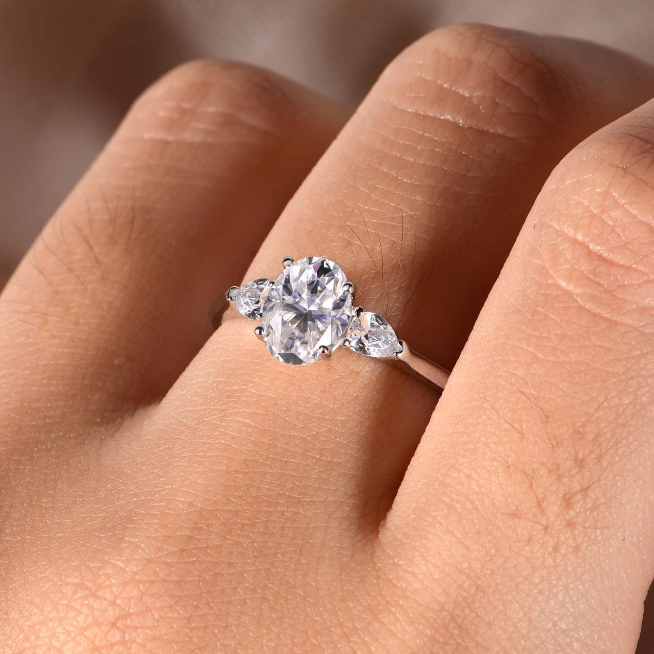 Oval Three-Stone Moissanite Ring with Pear Accents - alternate view