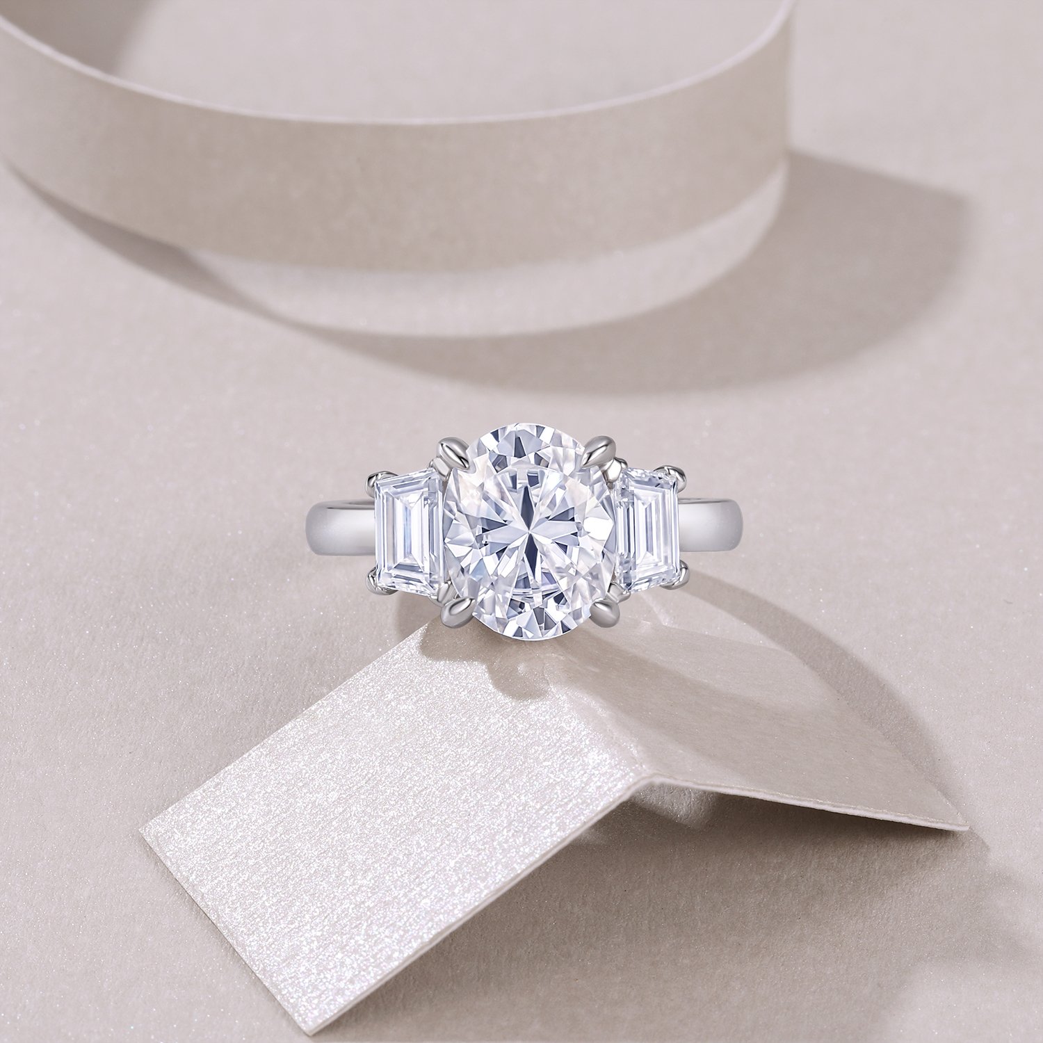 Oval Moissanite Three-Stone Ring with Emerald-Cut Sides | 18K White Gold - Image 4