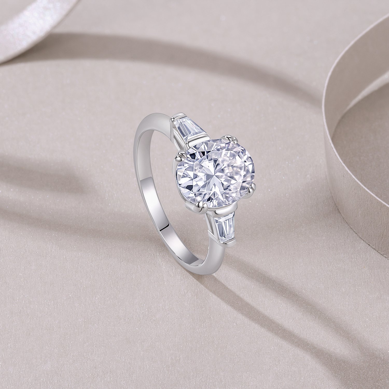 Oval Moissanite Three-Stone Ring with Tapered Baguettes - Image 5
