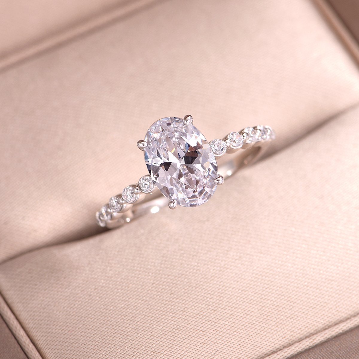 Oval Cut Moissanite Solitaire Ring with Pavé-Accent Band - Image 2