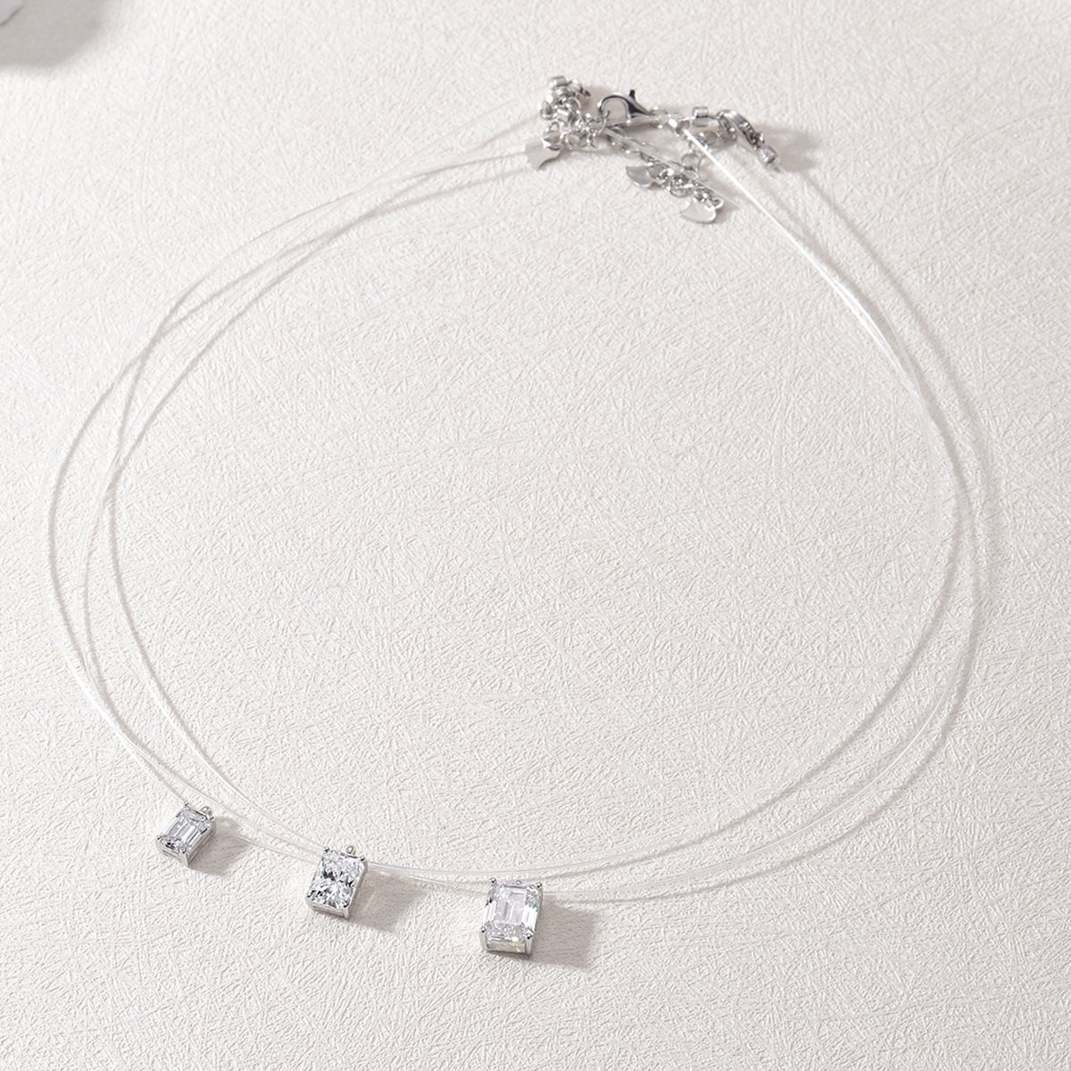 Emerald-Cut Floating Moissanite Necklace | Illusion-Set DEF VVS Sterling Silver - Image 3