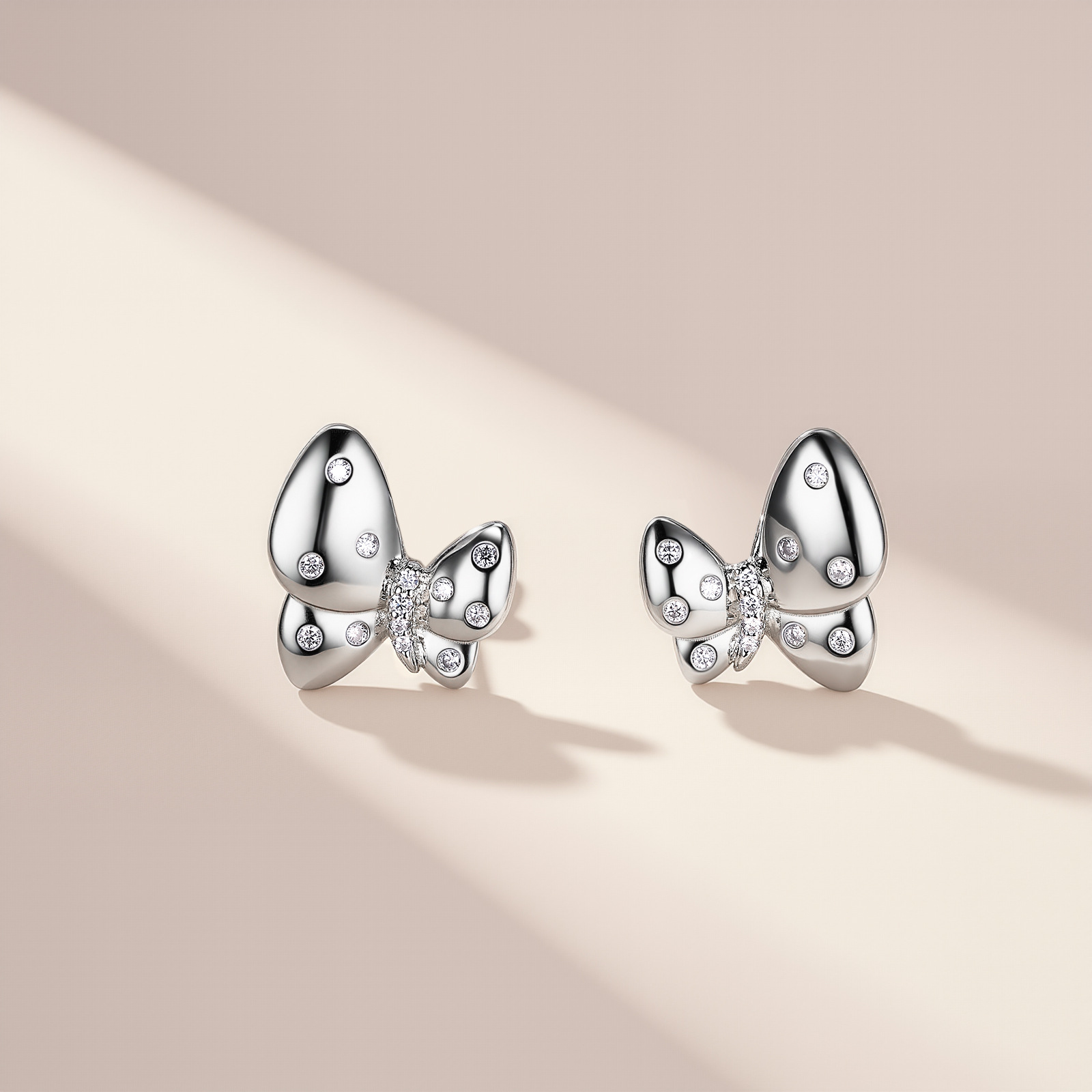 Polished Butterfly Scattered Moissanite Stud Earrings | 925 Silver - Image 2