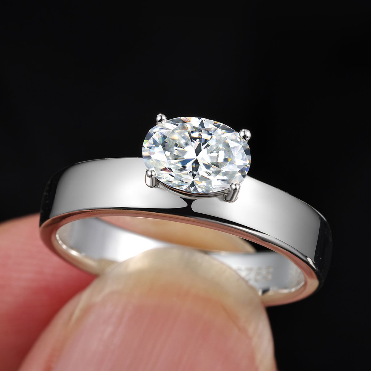 East-West Oval Moissanite Solitaire on a Polished Flat Band Ring - Image 3