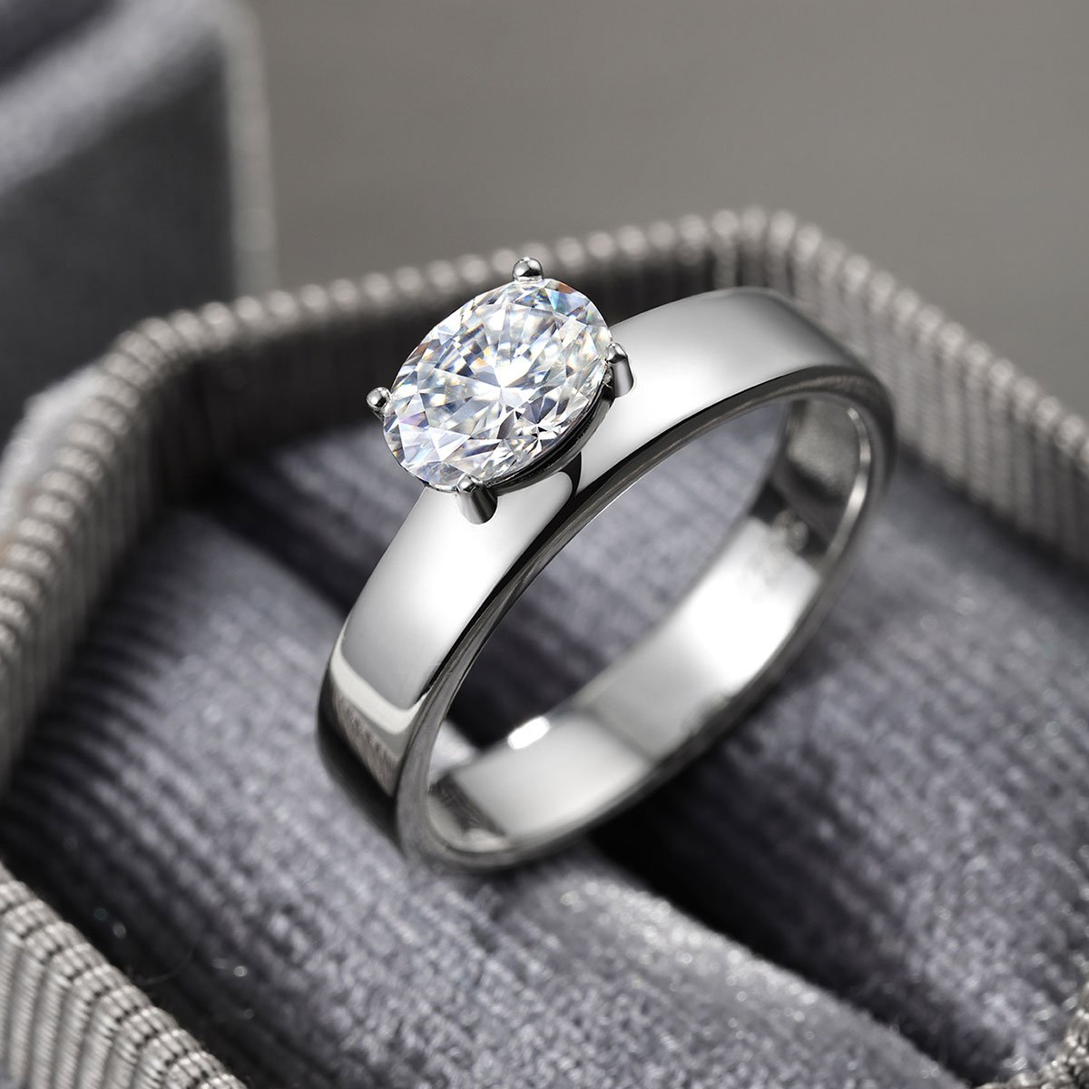 East-West Oval Moissanite Solitaire on a Polished Flat Band Ring - Image 5