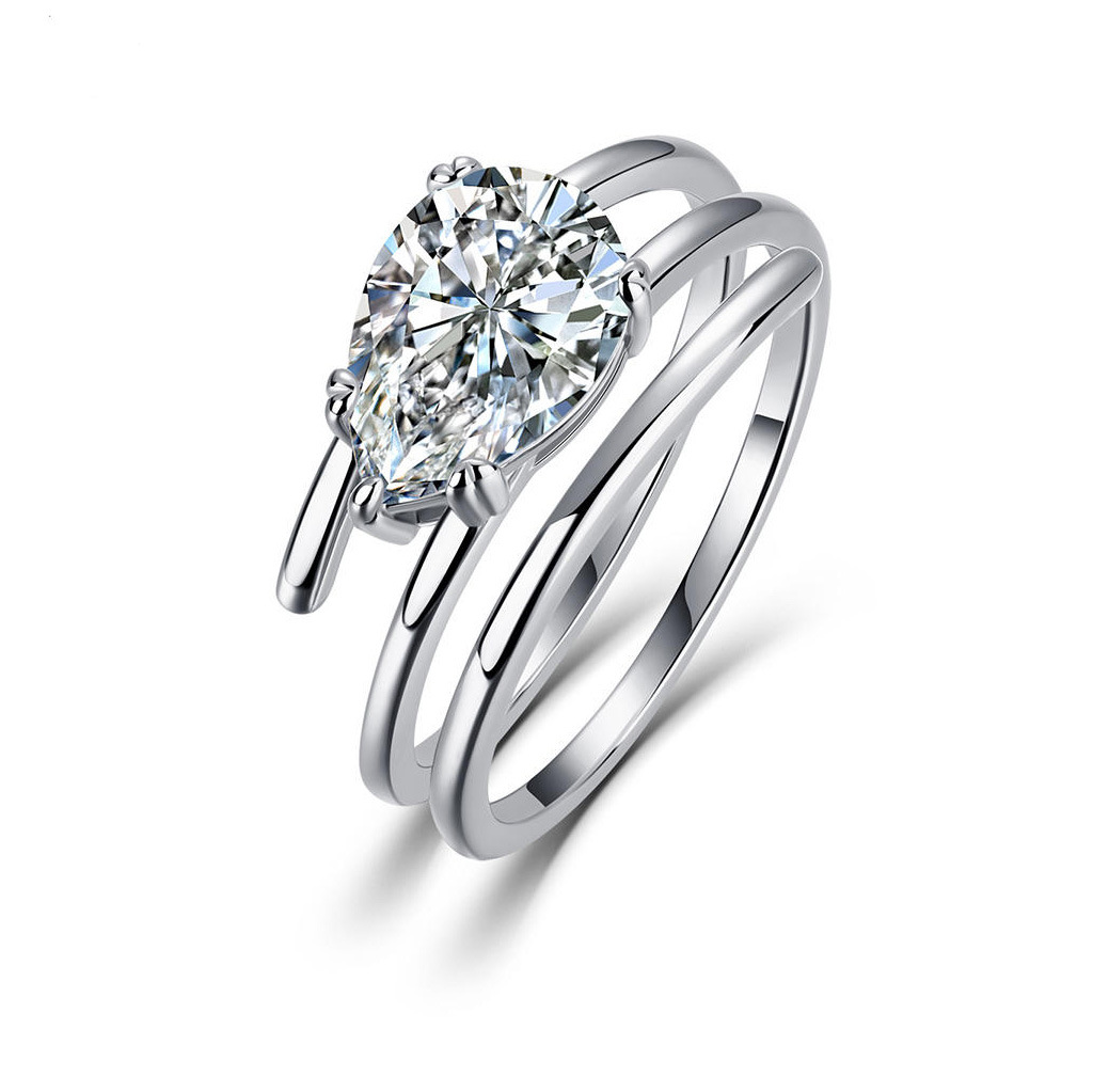 East-West Pear-Cut Moissanite Ring with Split Band in 18K Gold
