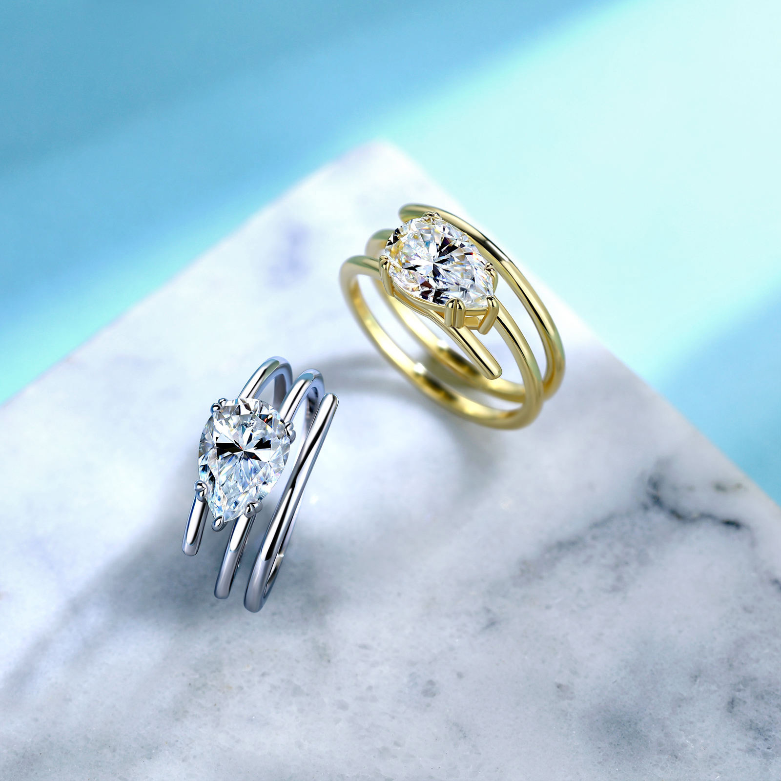 East-West Pear-Cut Moissanite Ring with Split Band in 18K Gold - Image 4