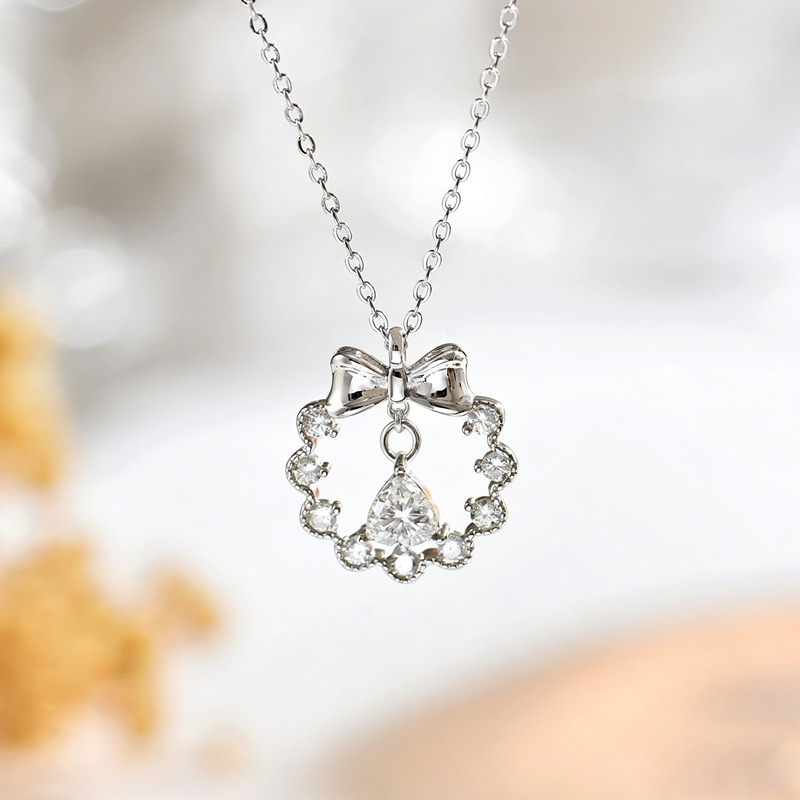 Moissanite Bow Wreath Pear Pendant Necklace | Ribbon & Pear-Cut Halo - Image 4