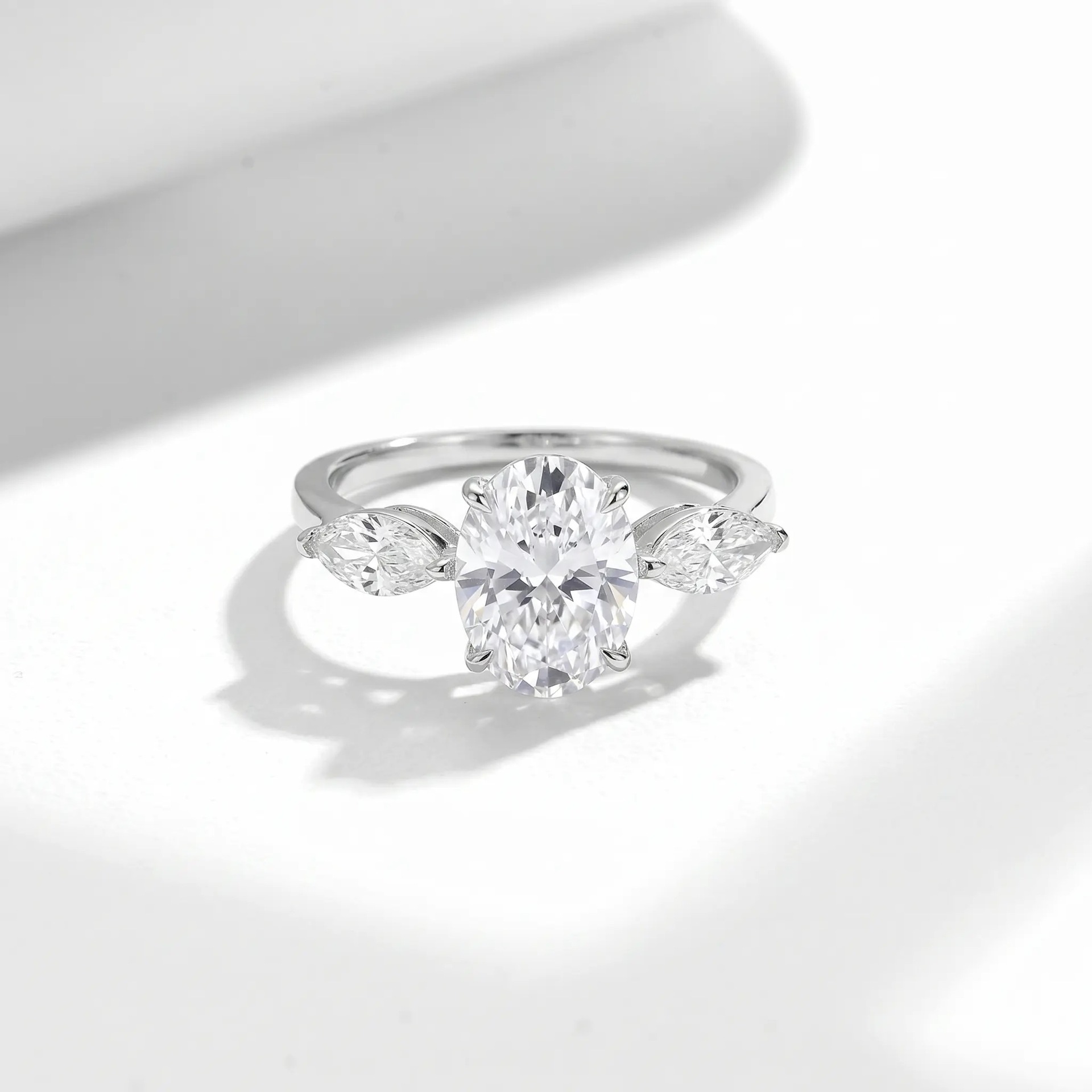 Oval & Marquise Three-Stone Moissanite Ring - Image 4