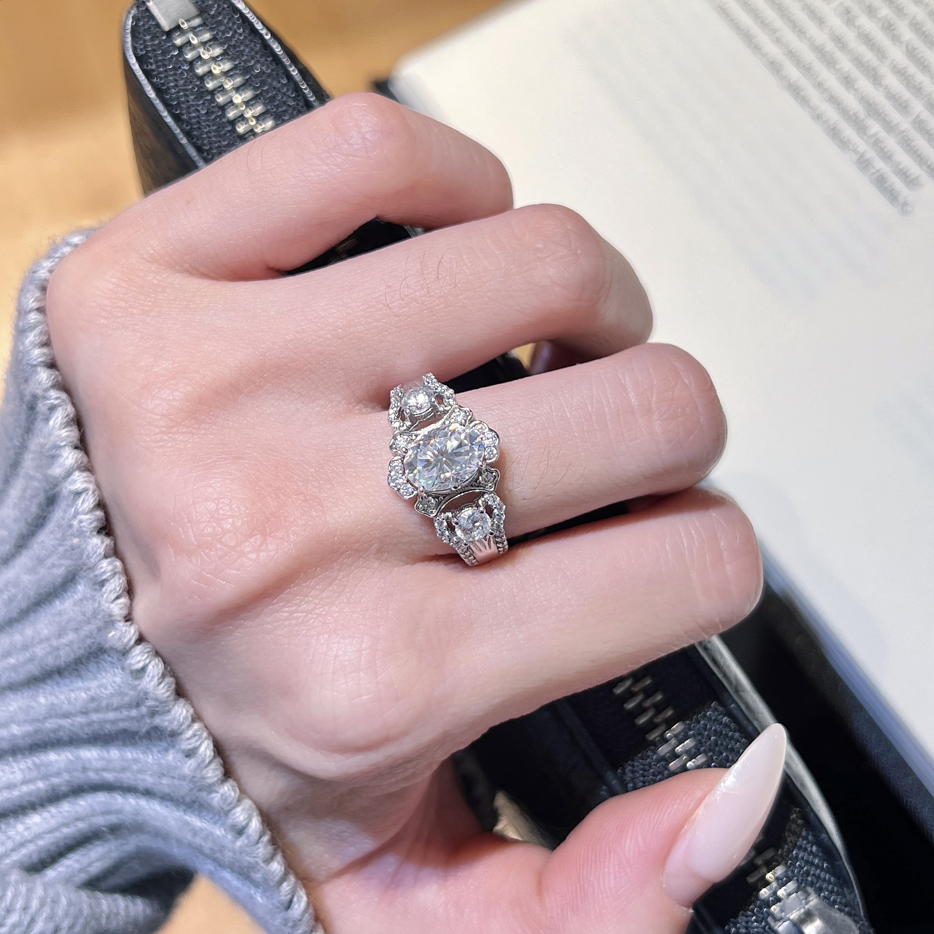 1.5ct Oval Moissanite Three-Stone Halo Ring - Image 3