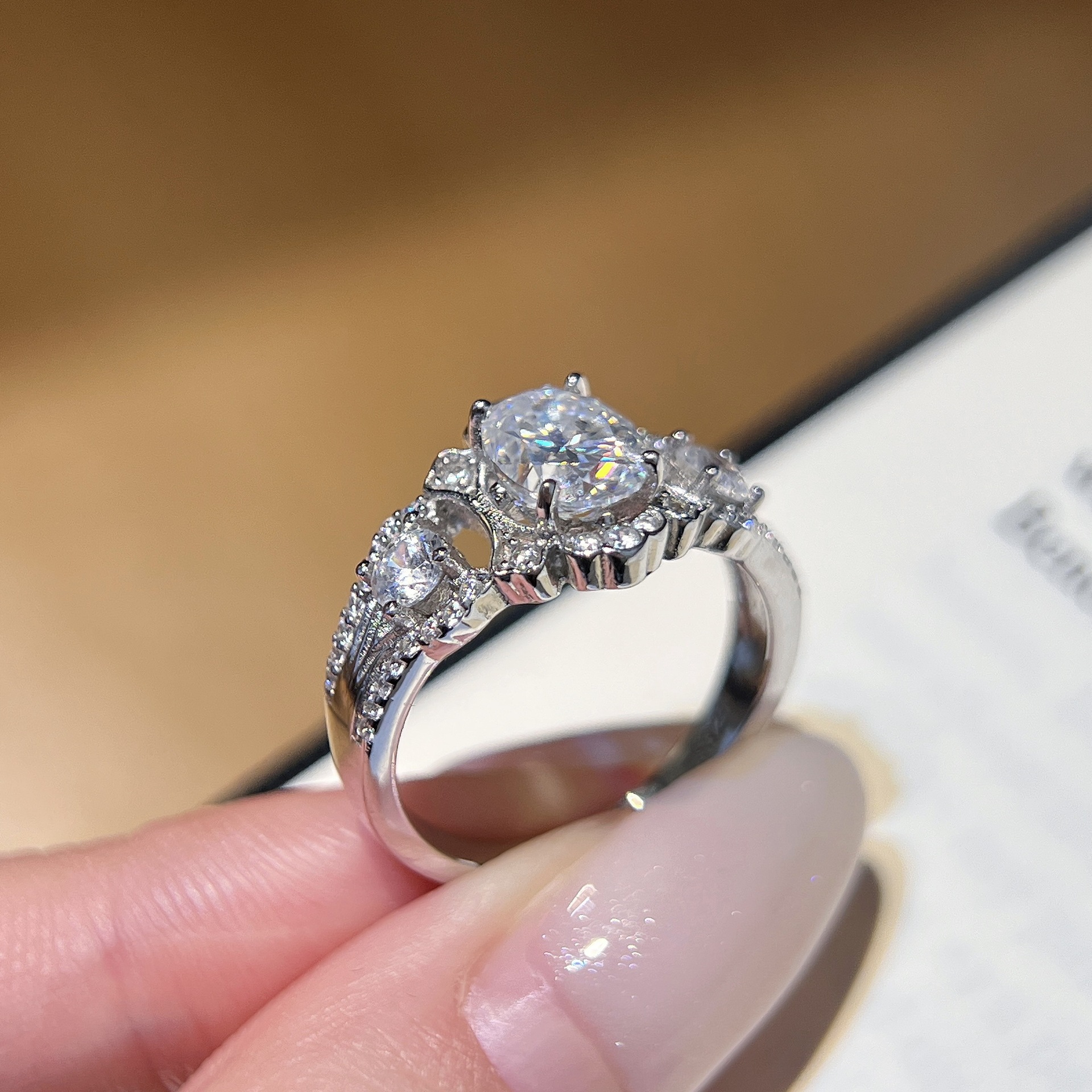 1.5ct Oval Moissanite Three-Stone Halo Ring - Image 4