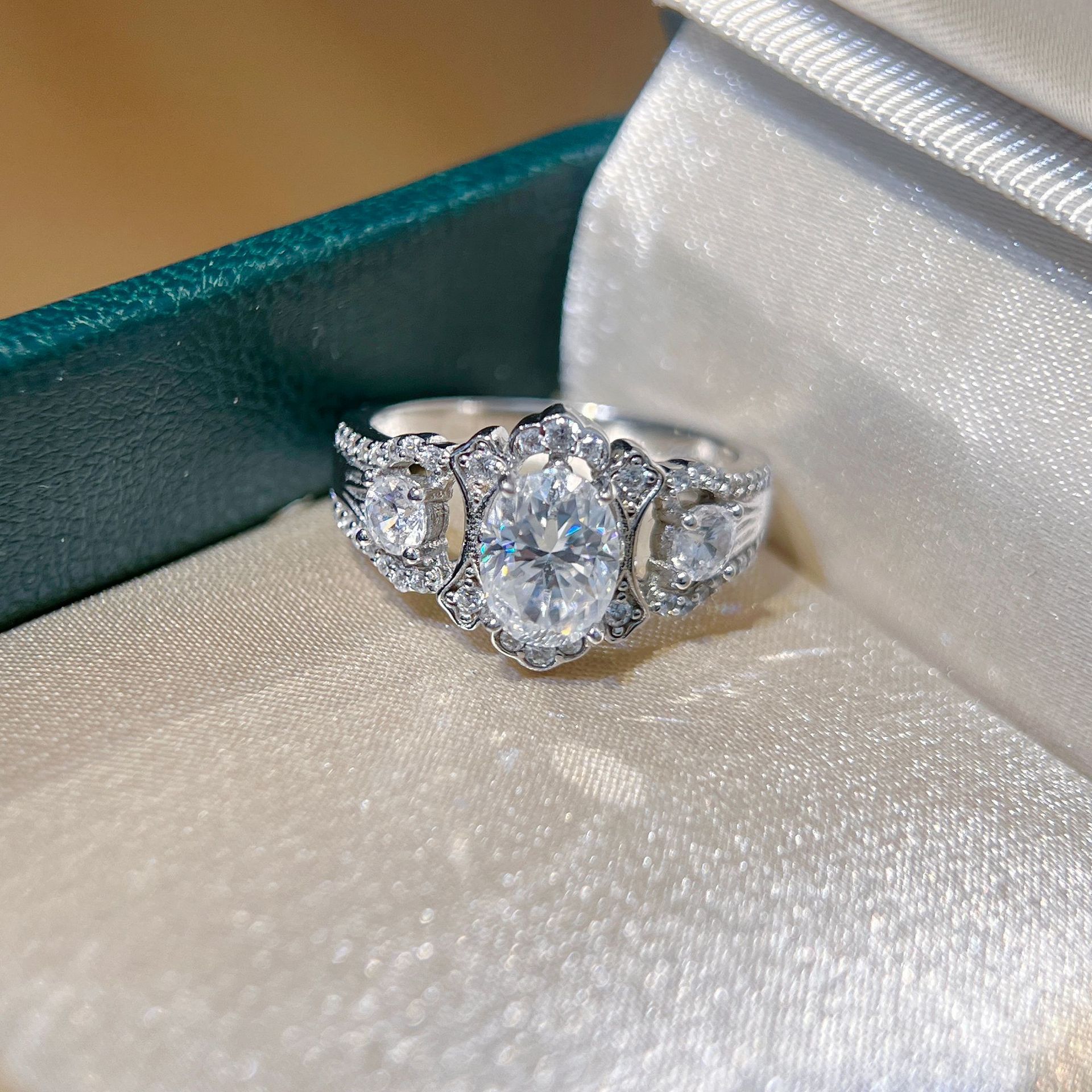 1.5ct Oval Moissanite Three-Stone Halo Ring - Image 5