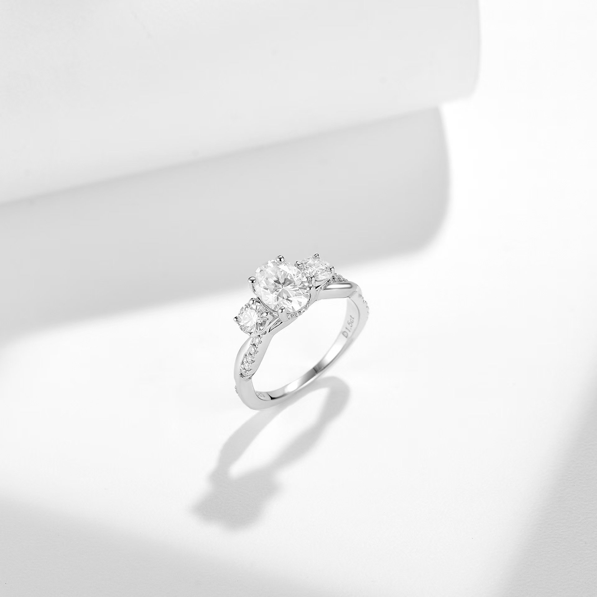 1.5ct Oval Moissanite Three-Stone Twist Ring - Image 3