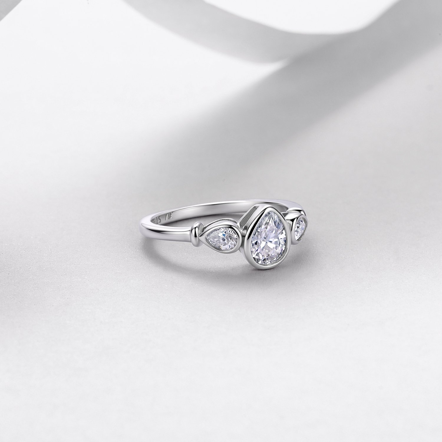 Pear Moissanite Three-Stone Bezel Ring – 1.4ct DEW - alternate view