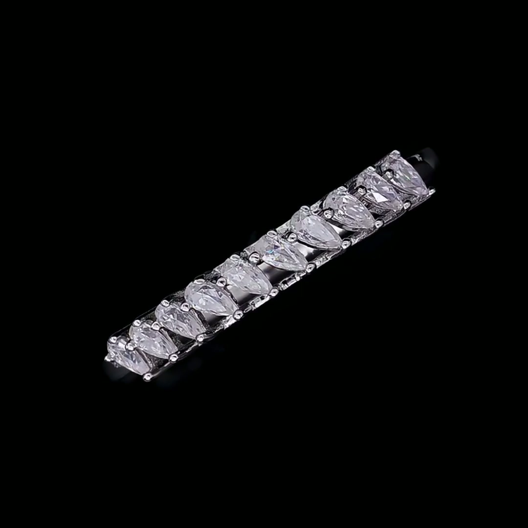 Asymmetric Pear Moissanite Half-Eternity Ring | Angled Row Sterling Silver Stacking Band product video thumbnail