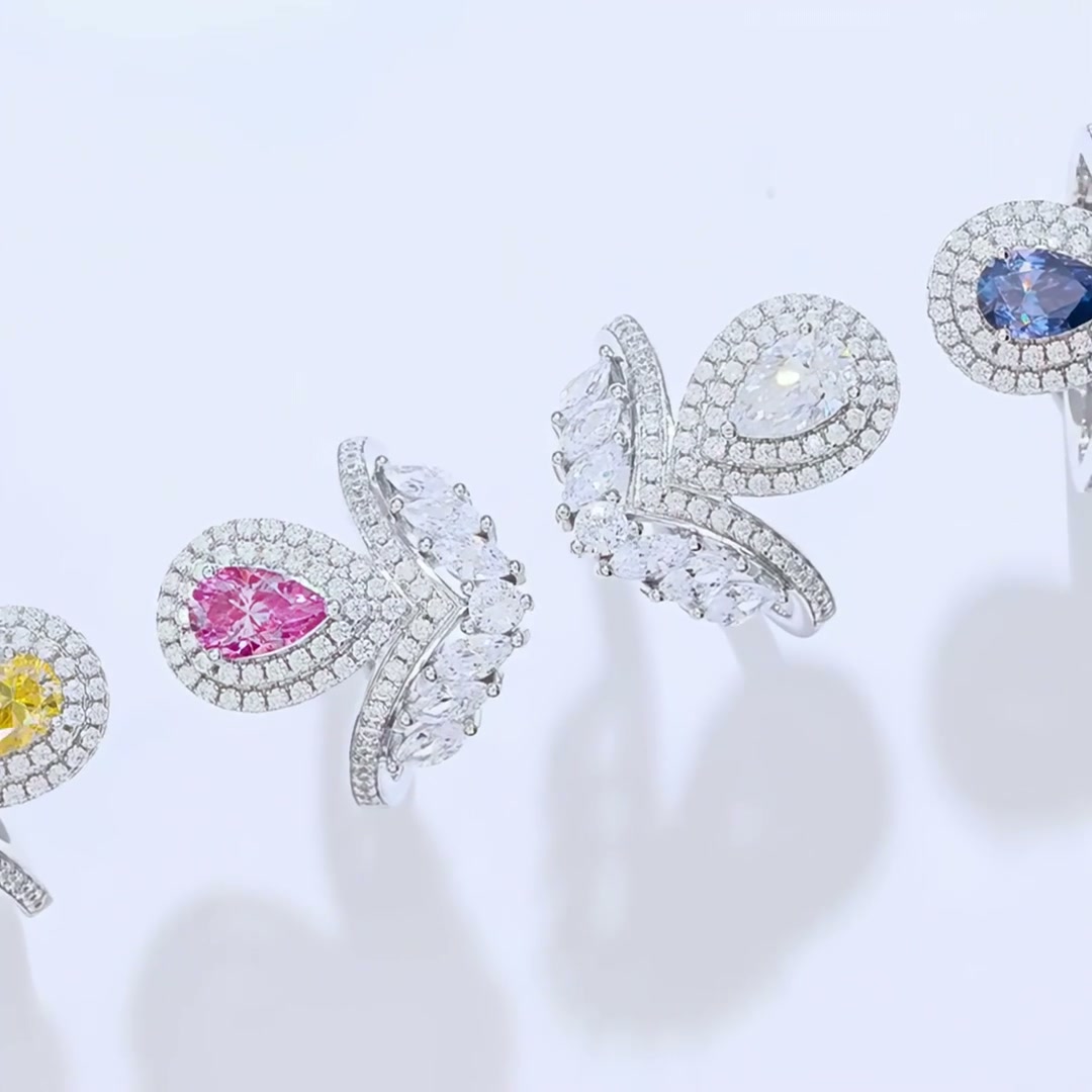 Pear Cut Moissanite Bypass Ring | Marquise Wing Crown | 925 Sterling Silver product video thumbnail
