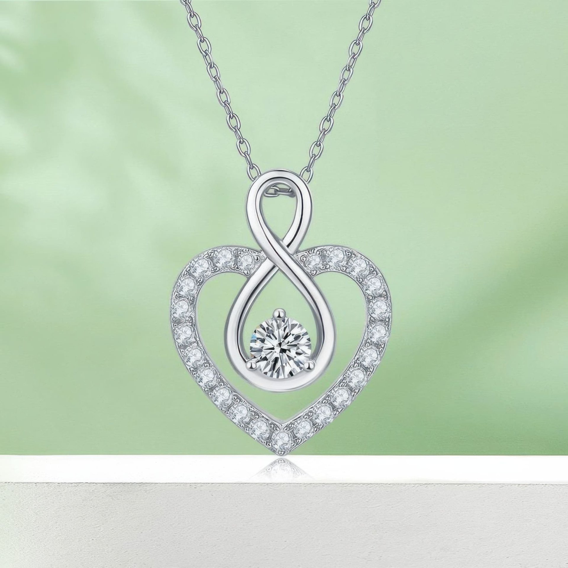 Infinity Heart Moissanite Necklace | Pave Heart with Inner Infinity & Round Center Stone | 925 Sterling Silver, 3 Gold Tones...