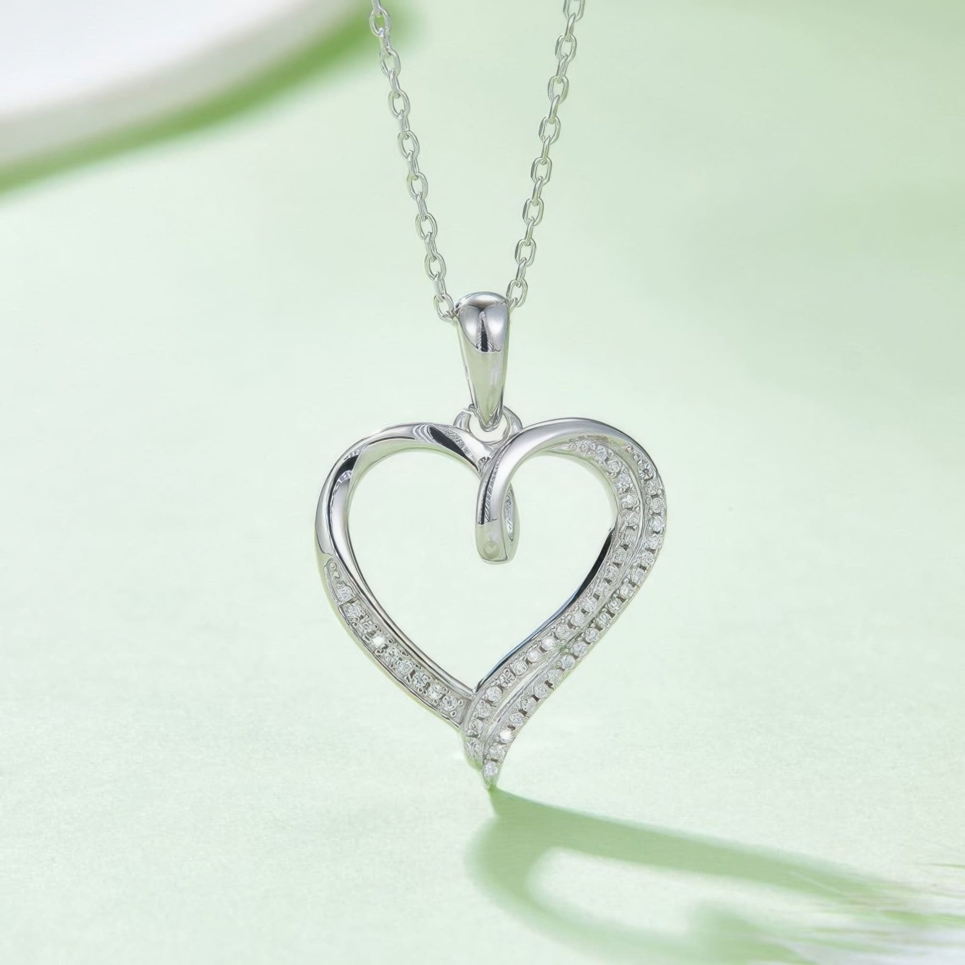 Ribbon Twist Heart Moissanite Pendant Necklace | Sterling Silver Open Heart with Looped Crossover Top | 3 Plating Options -...