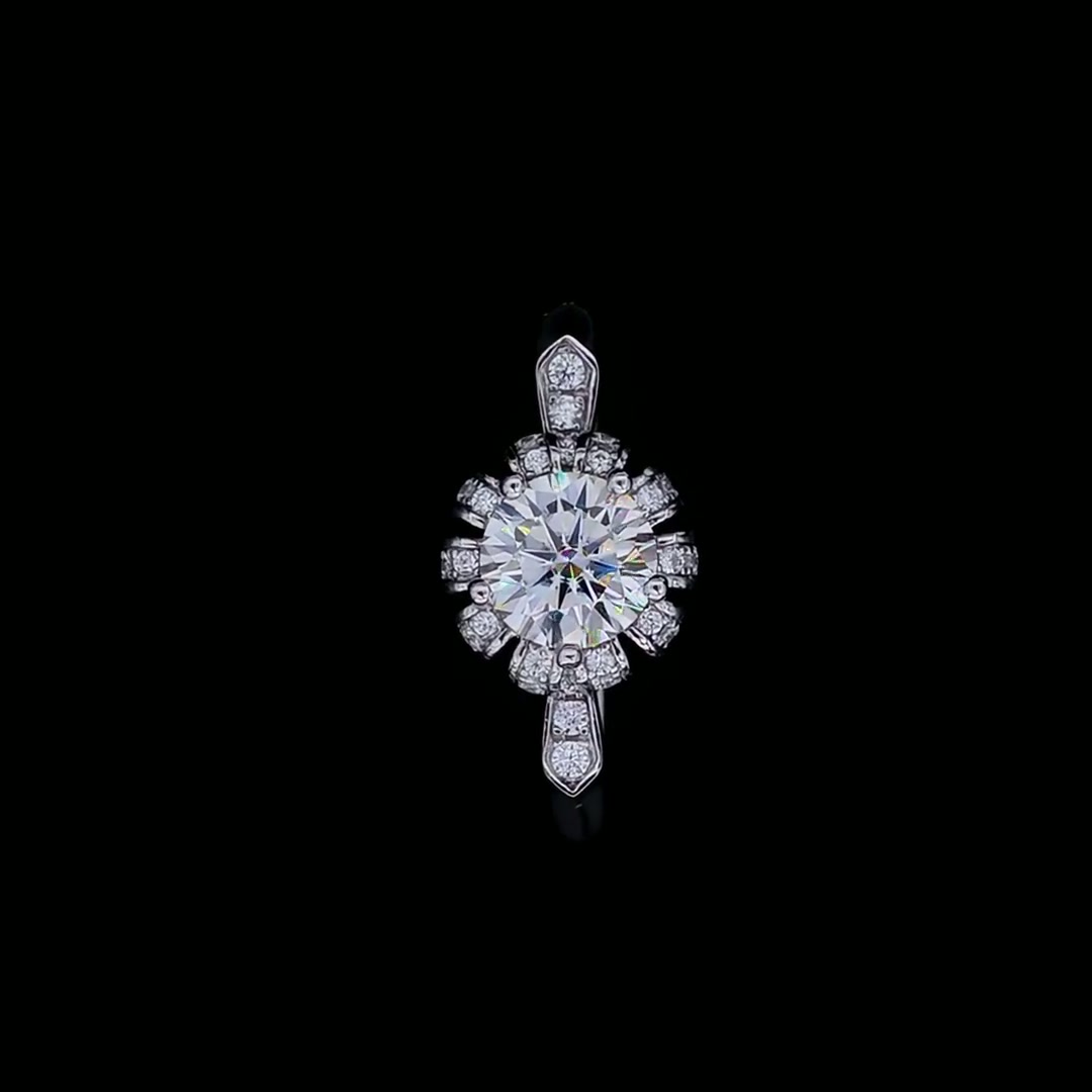 Round Halo Moissanite Engagement Ring | 925 Sterling Silver | Pinched Pavé Shoulders product video thumbnail