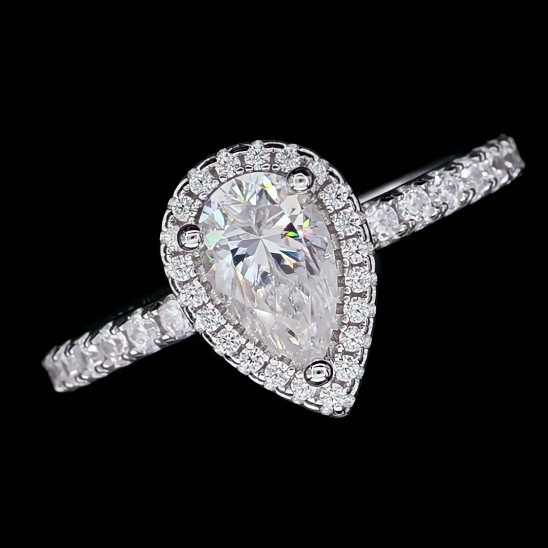 Pear Cut Moissanite Halo Ring | 1ct DEW (6.5mm) D Color | 925 Sterling Silver Engagement Ring product video thumbnail