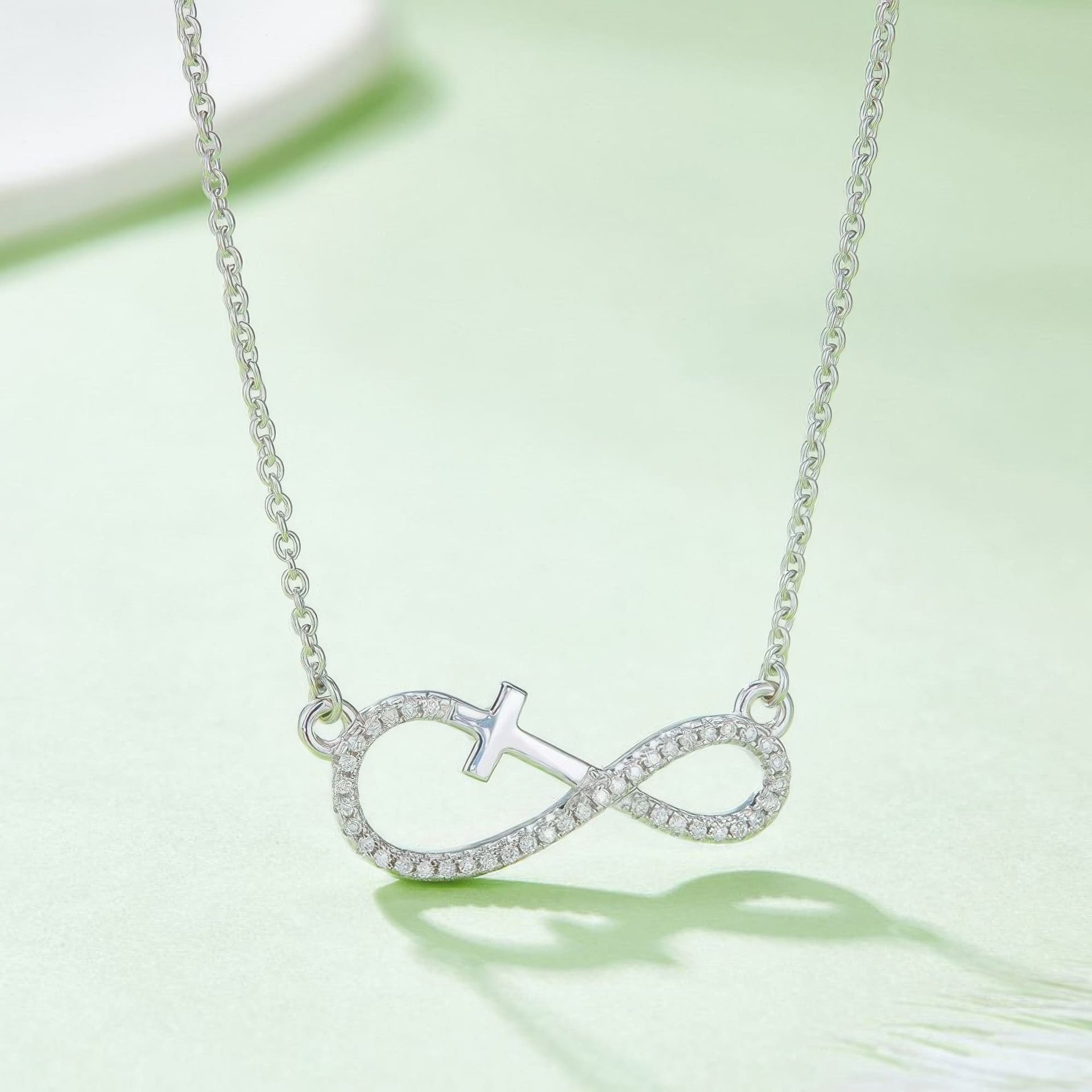Cross Infinity Moissanite Necklace | Pave Sideways Infinity with Cross | 3-Tone Silver - alternate view