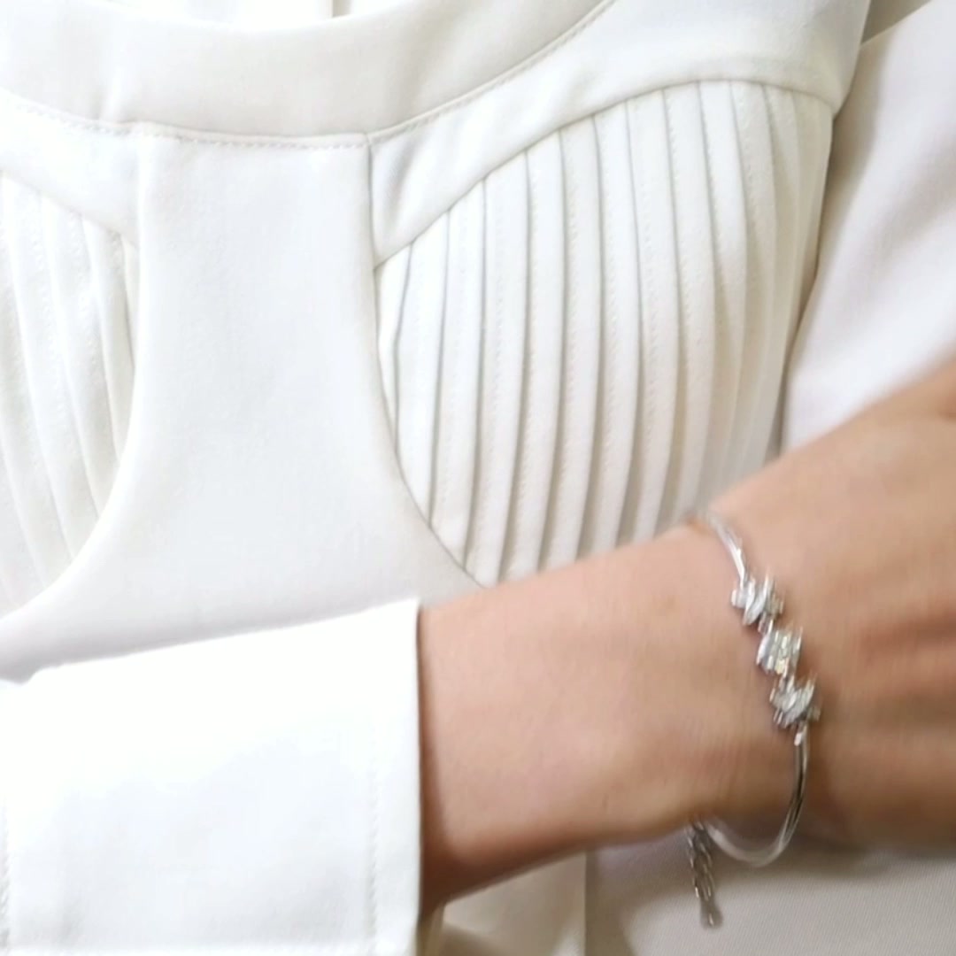 1ct Moissanite XO Bracelet | Round-Cut Center, Pave X Stations | 925 Sterling Silver, Rhodium-Plated product video thumbnail