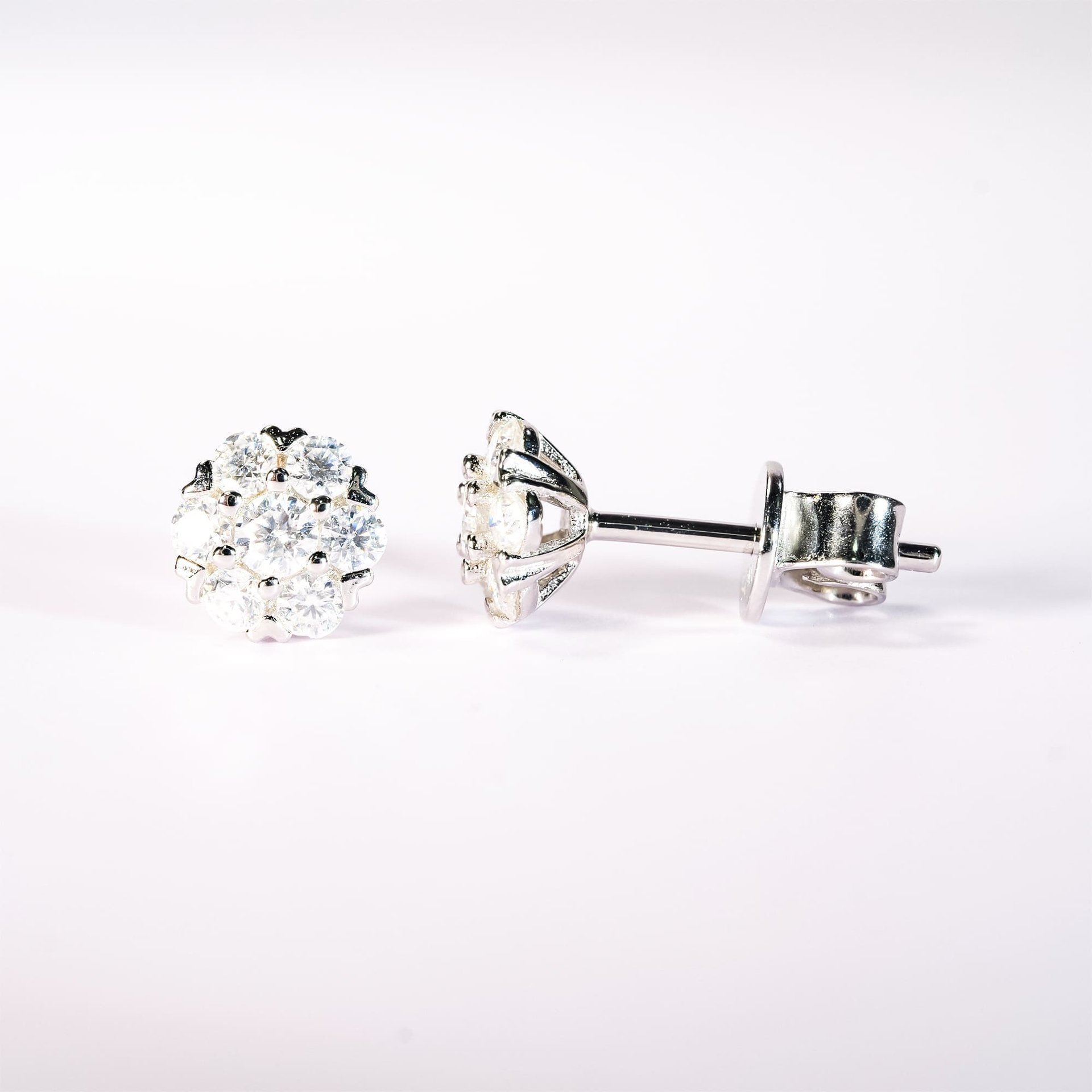 0.48ct DEW Moissanite Cluster Stud Earrings | 7-Stone Flower Halo | 925 Silver Rhodium-Plated - Image 4