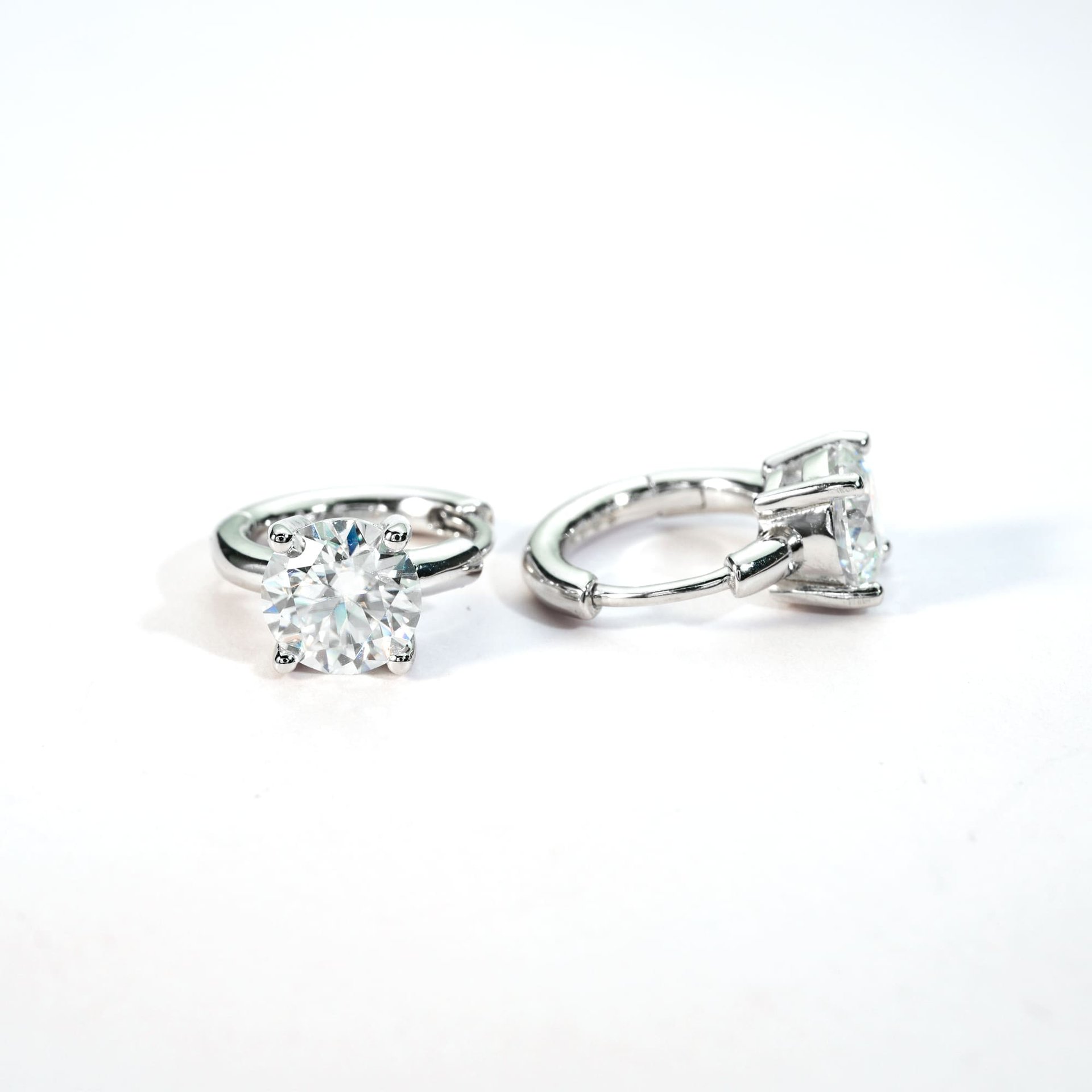 Moissanite Huggie Hoop Earrings | Round Brilliant Four-Prong Solitaire in Sterling Silver - Image 3