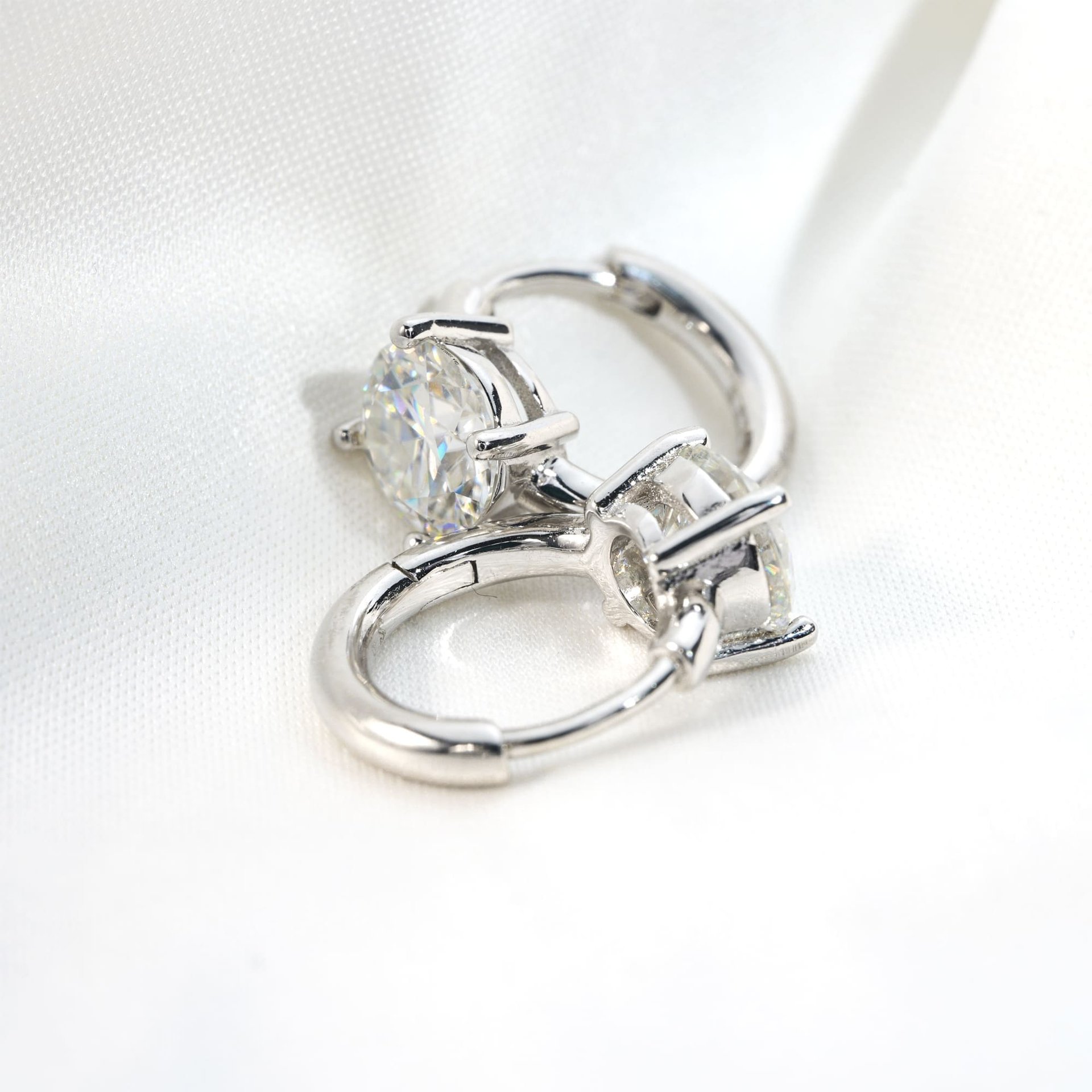Moissanite Huggie Hoop Earrings | Round Brilliant Four-Prong Solitaire in Sterling Silver - Image 4