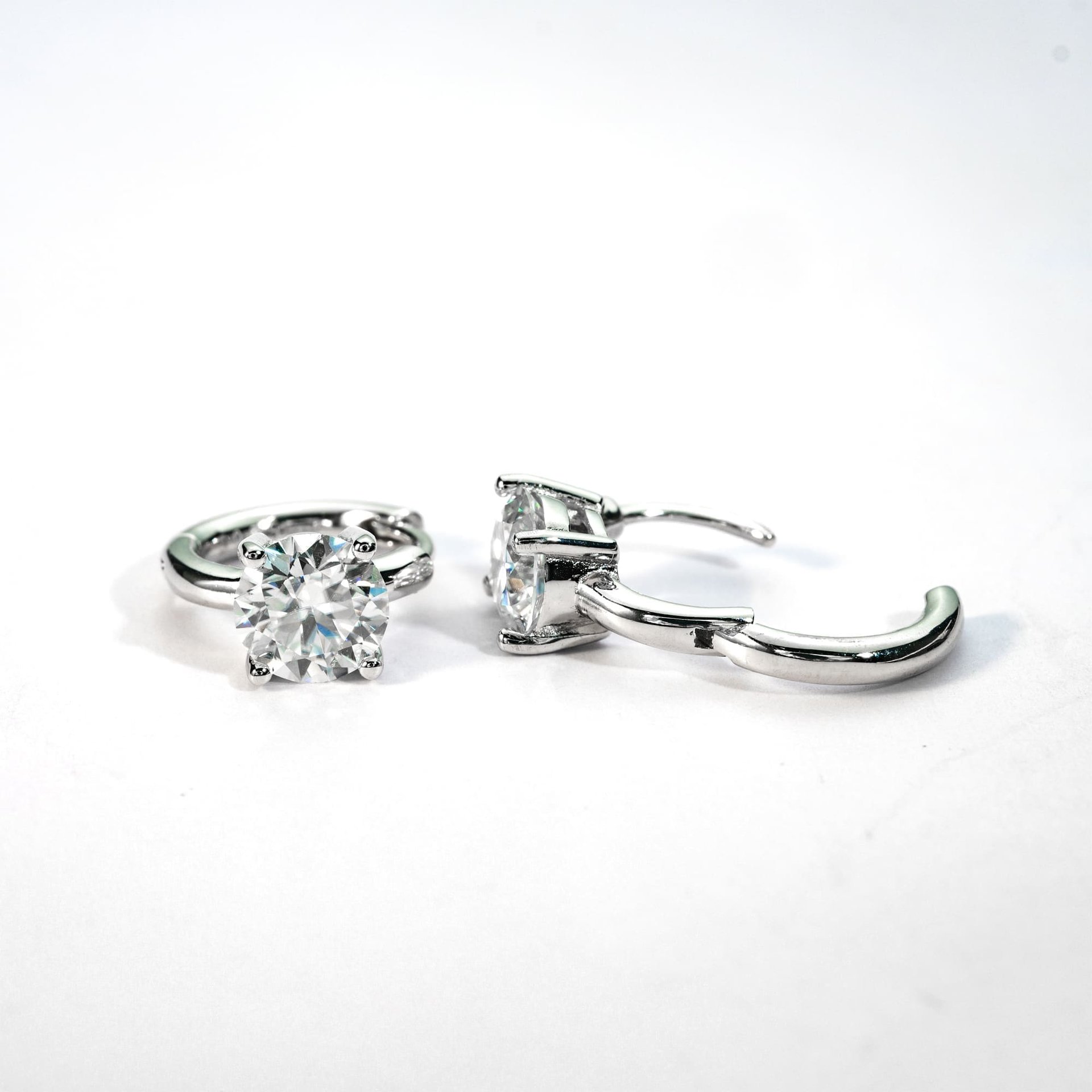Moissanite Huggie Hoop Earrings | Round Brilliant Four-Prong Solitaire in Sterling Silver - Image 5