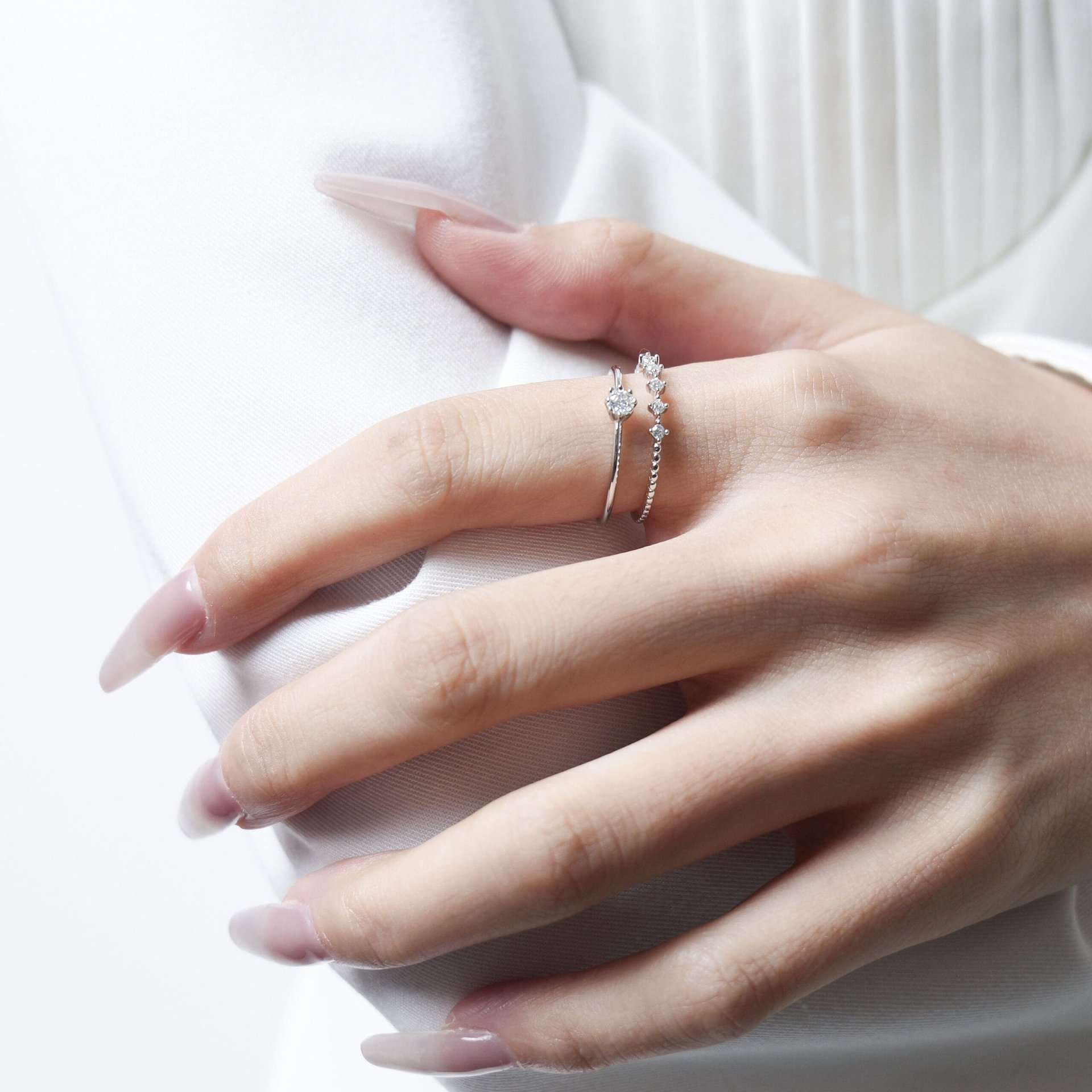 2-Piece Moissanite Stackable Ring Set | Round Solitaire + Scattered Accent Band | 925 White Gold-Plated Silver - Image 2