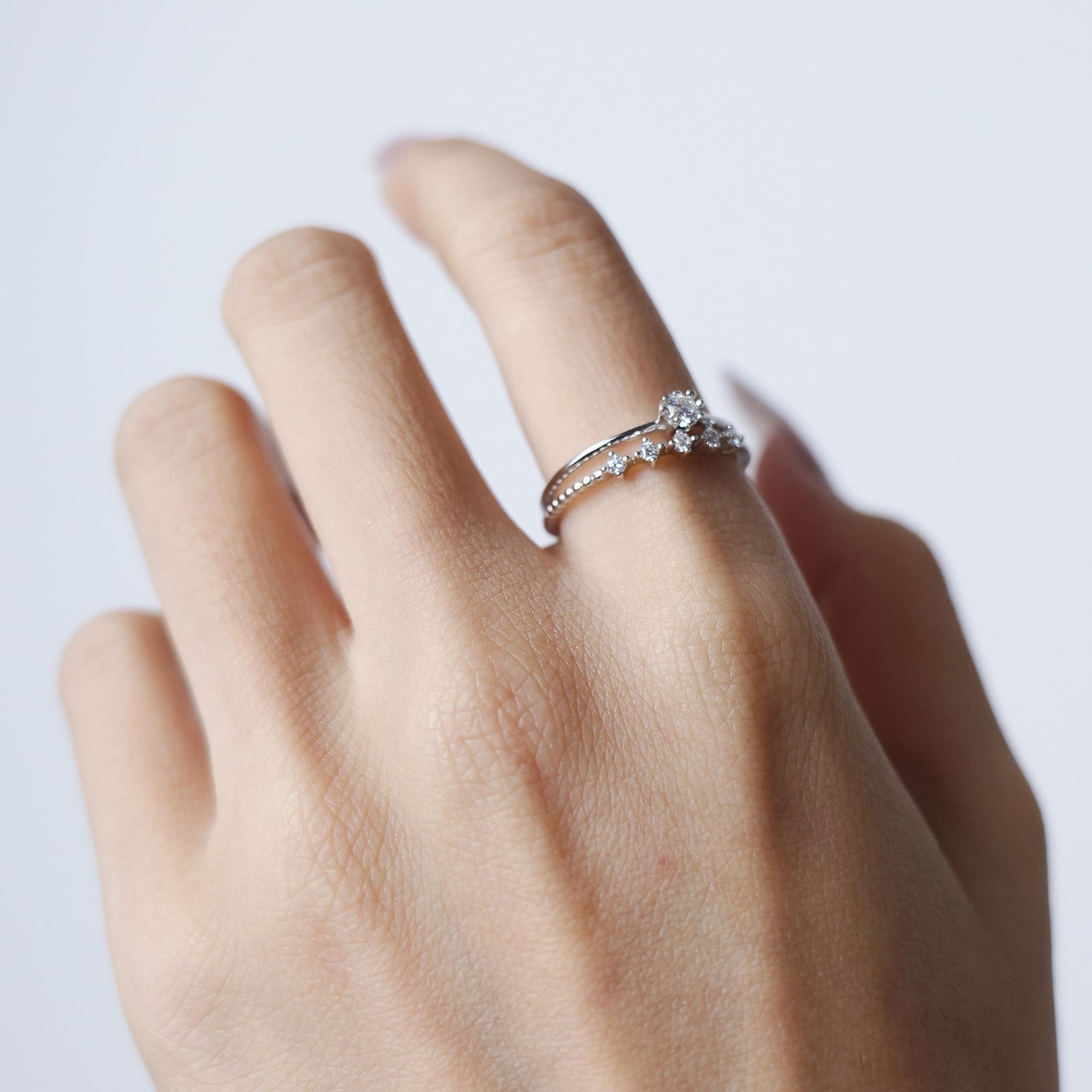 2-Piece Moissanite Stackable Ring Set | Round Solitaire + Scattered Accent Band | 925 White Gold-Plated Silver - Image 4