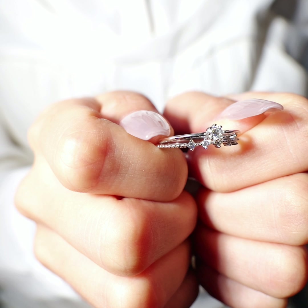 2-Piece Moissanite Stackable Ring Set | Round Solitaire + Scattered Accent Band | 925 White Gold-Plated Silver product video thumbnail