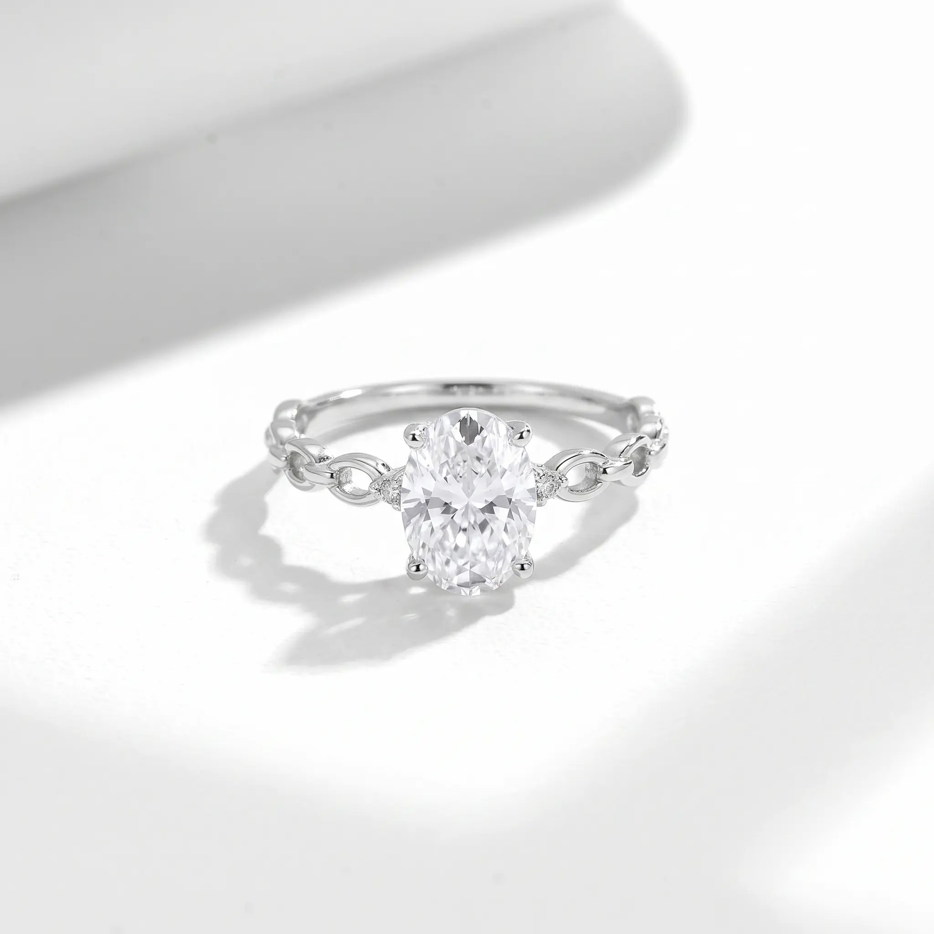 Oval Moissanite Solitaire Ring with Interlocking-Link Band - Image 4