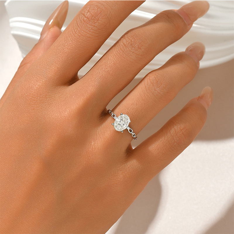 Oval Moissanite Solitaire Ring with Interlocking-Link Band - Image 5