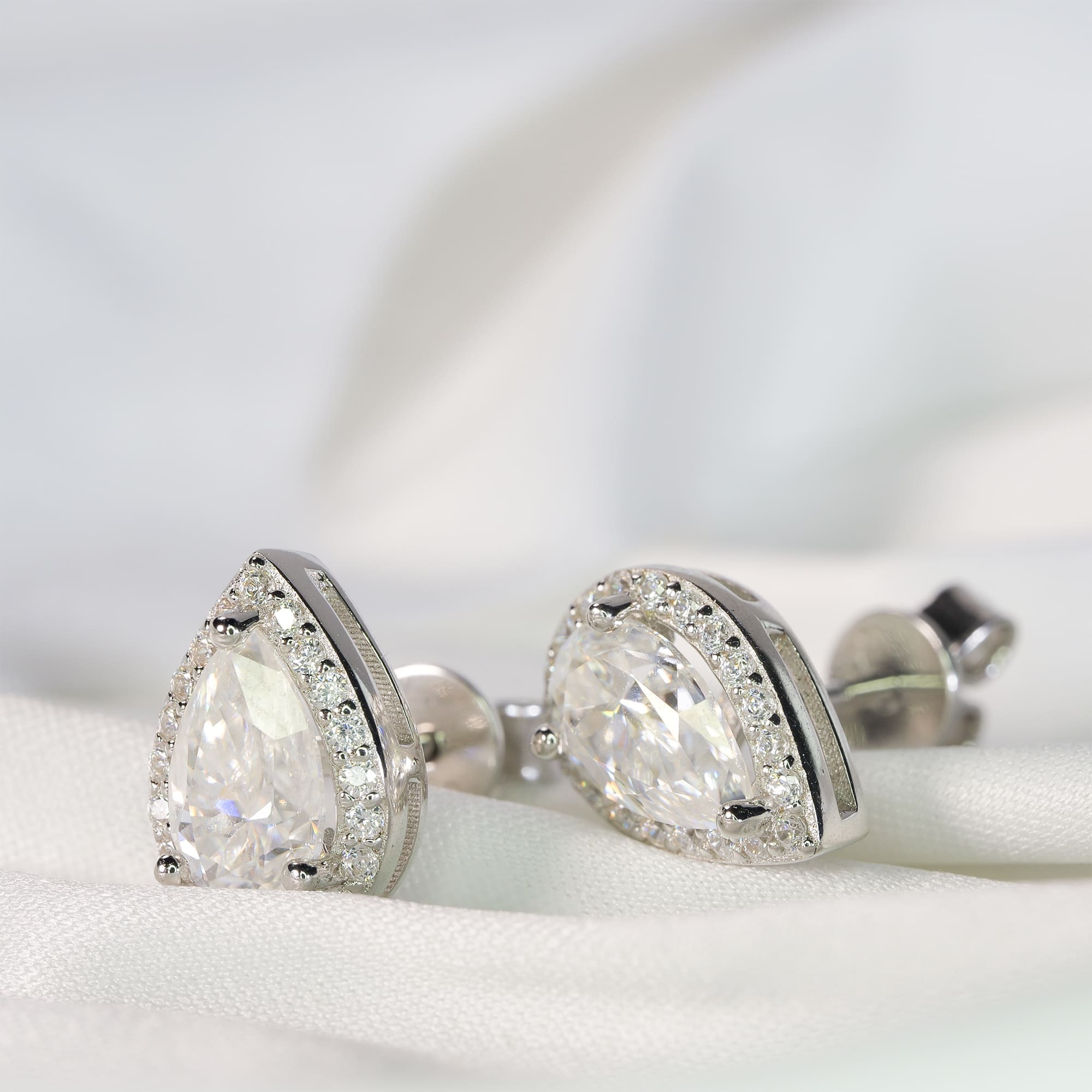 Pear Cut Moissanite Halo Stud Earrings - 925 Silver Plated with White Gold - Image 5