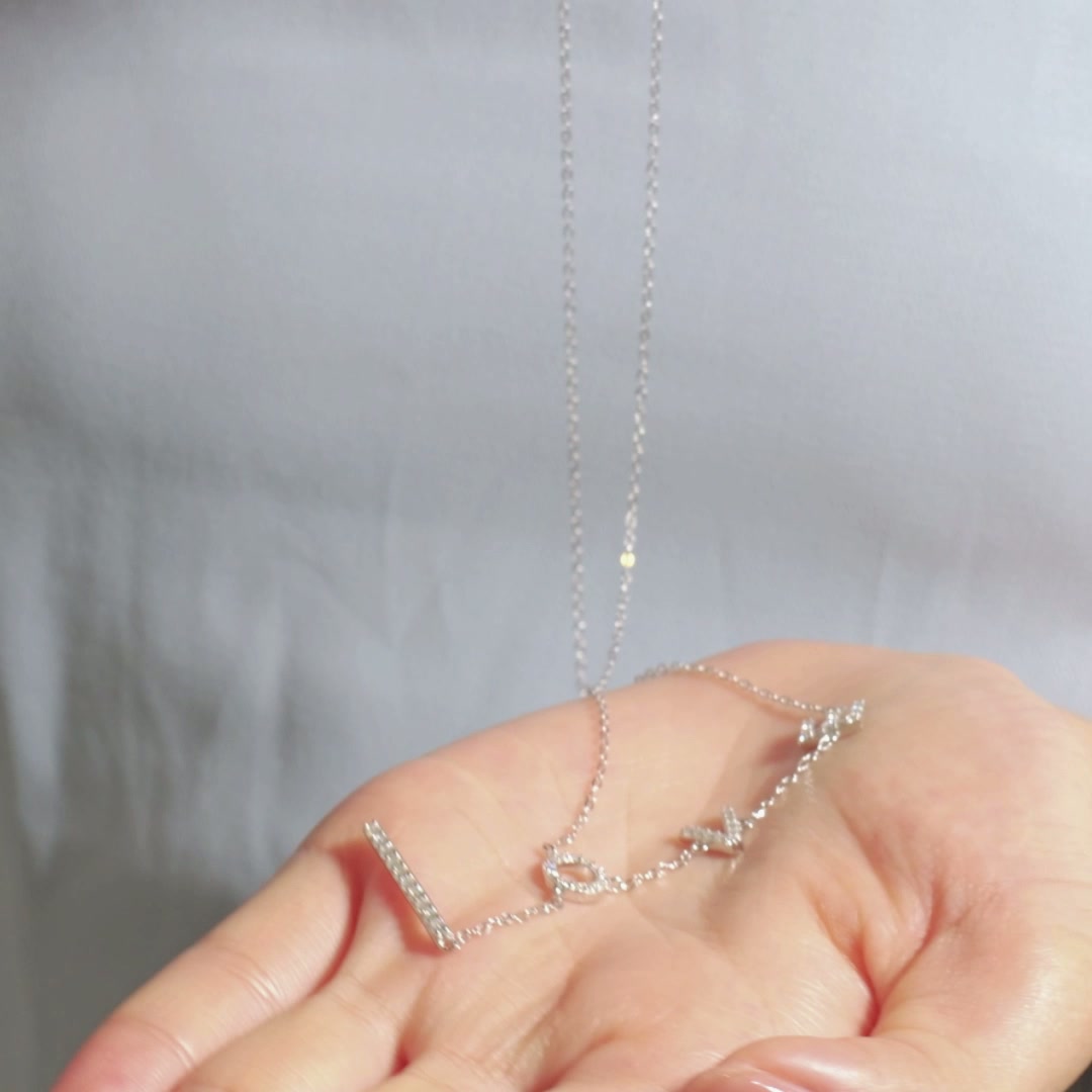 0.52CT LOVE Moissanite Pendant Necklace in 925 Silver, Elegant Channel Setting product video thumbnail