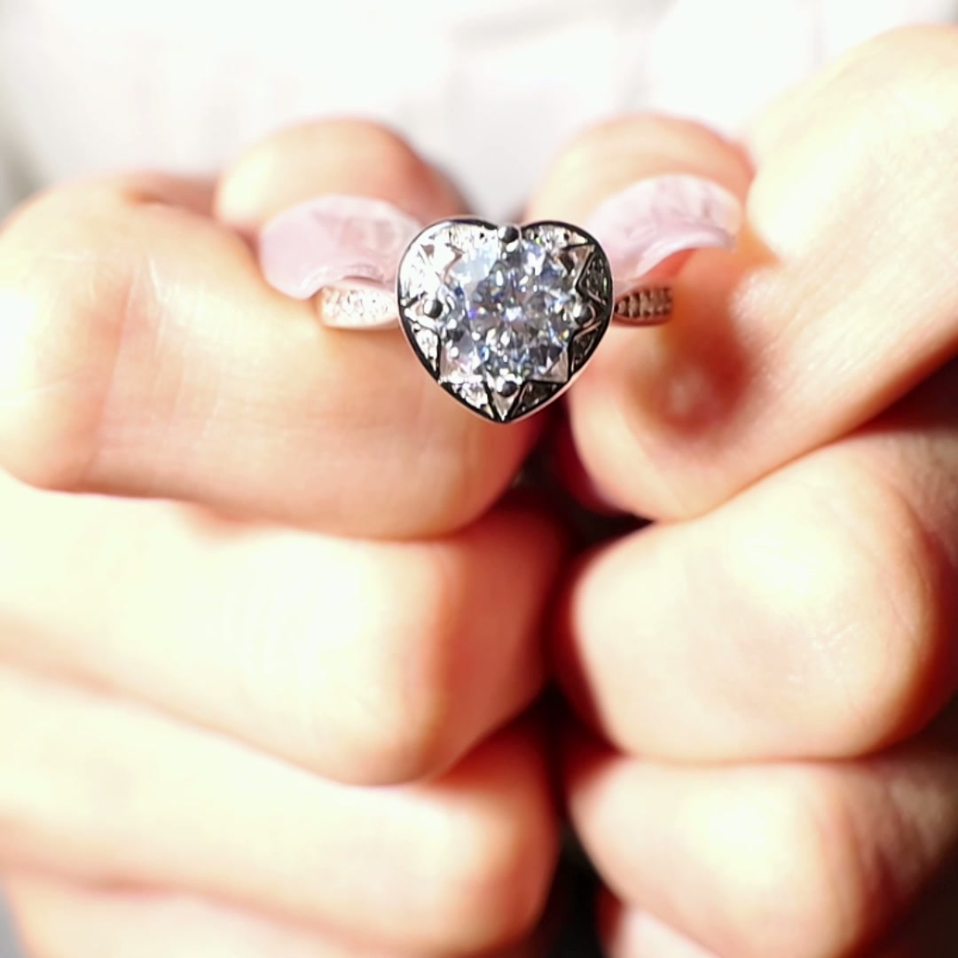 Romantic 925 Silver Heart-Shaped Engagement Ring with Brilliant Moissanite Center Stone product video thumbnail