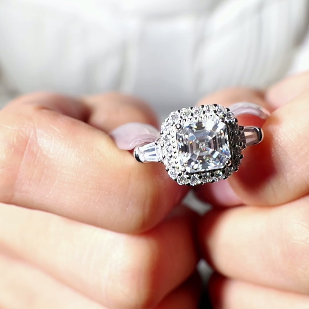 Elegant 2CT Asscher Cut Moissanite Engagement Ring with Halo & Tapered Baguettes in White Gold-Plated 925 Silver product video thumbnail