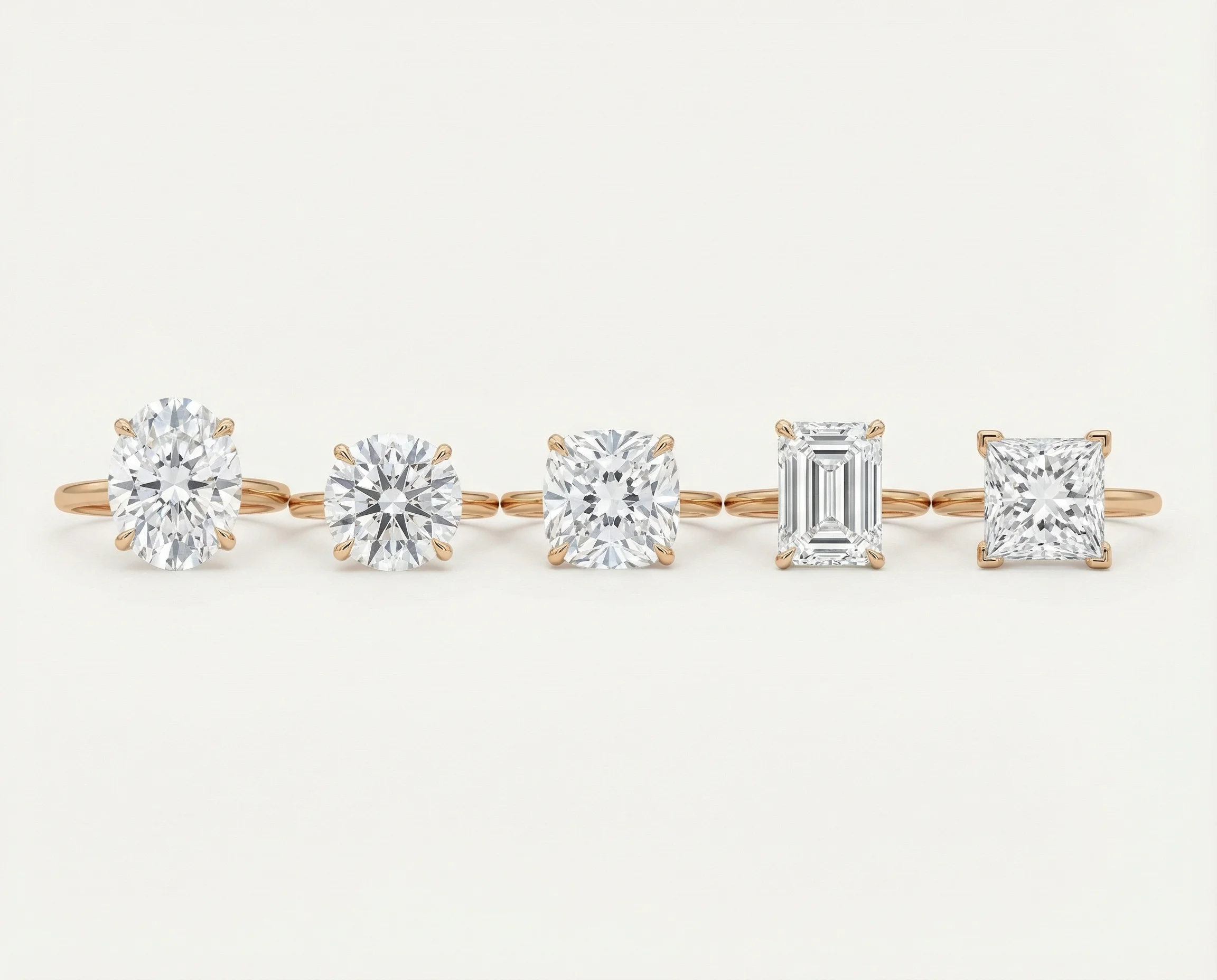 Comparison of oval, round, cushion, emerald, and princess cut moissanite engagement rings